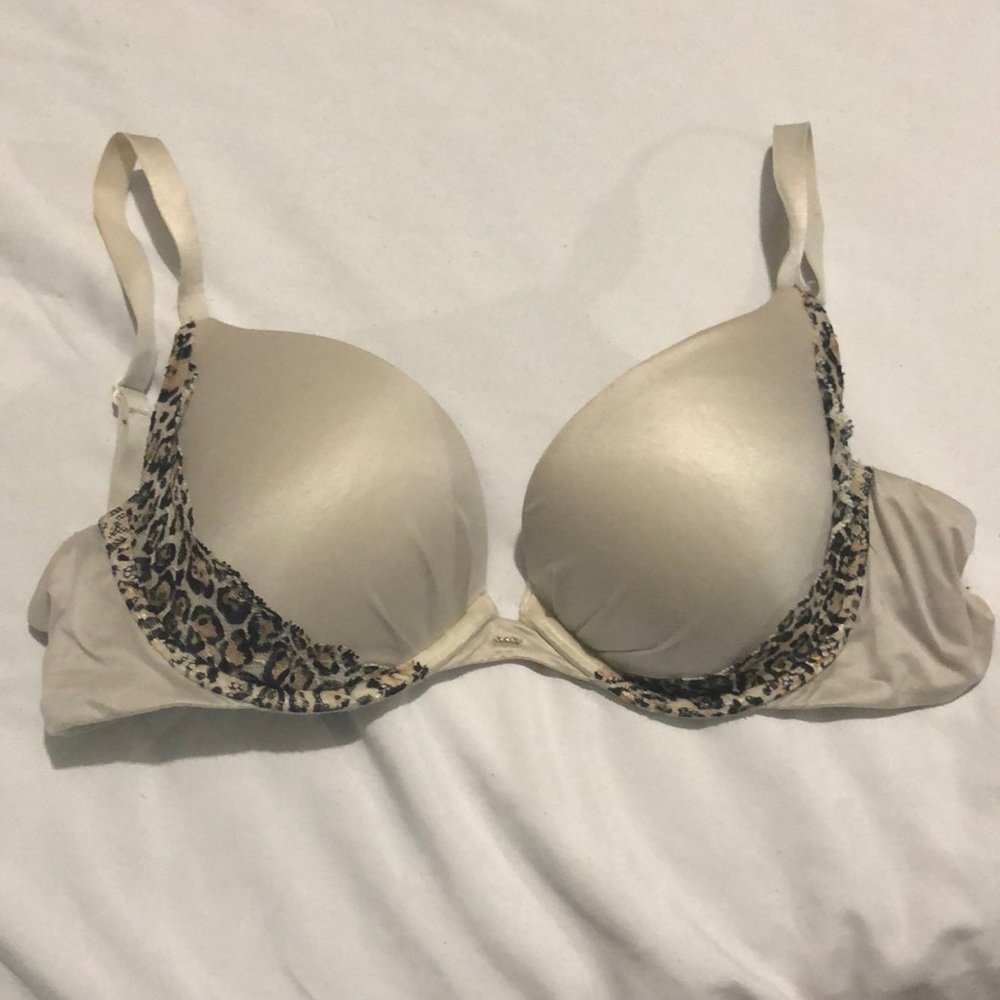 Victoria’s Secret cream colored bra with cheetah